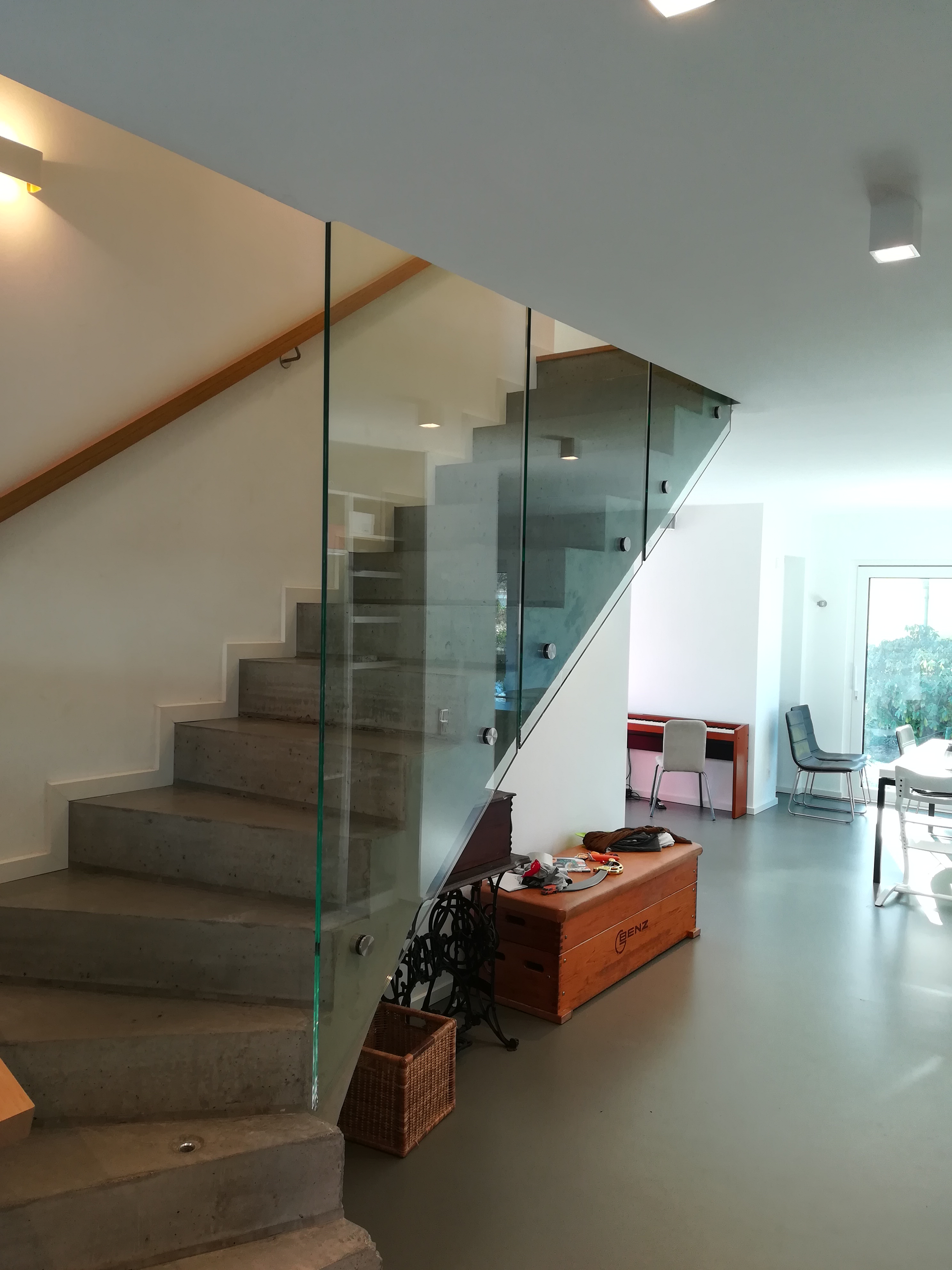 spiral stairs with wall made of glass